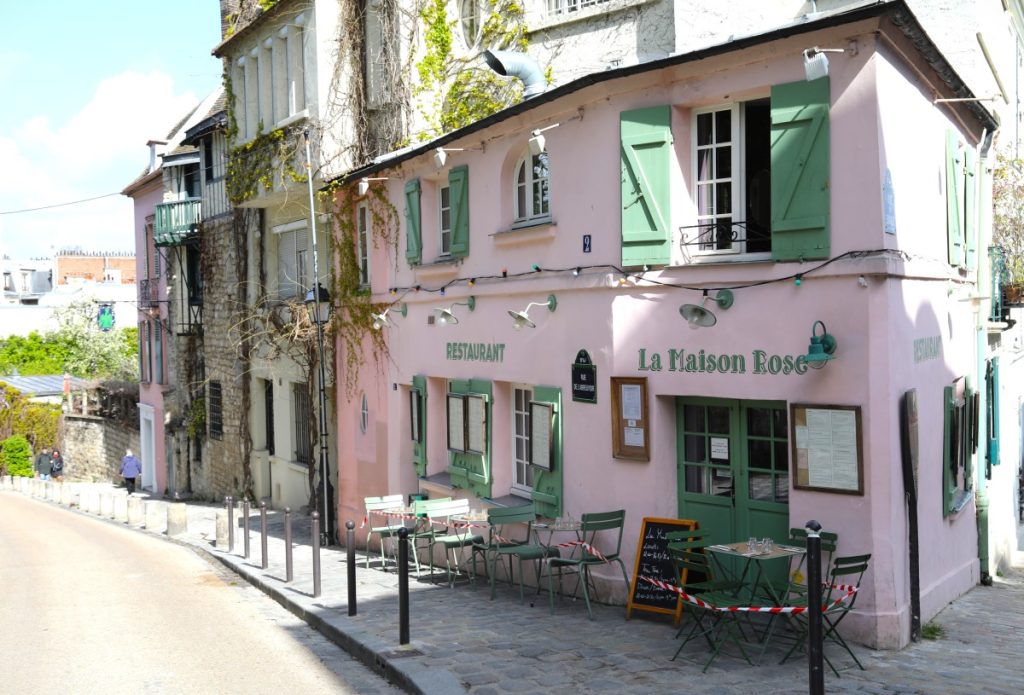 pink cafe with green shutters